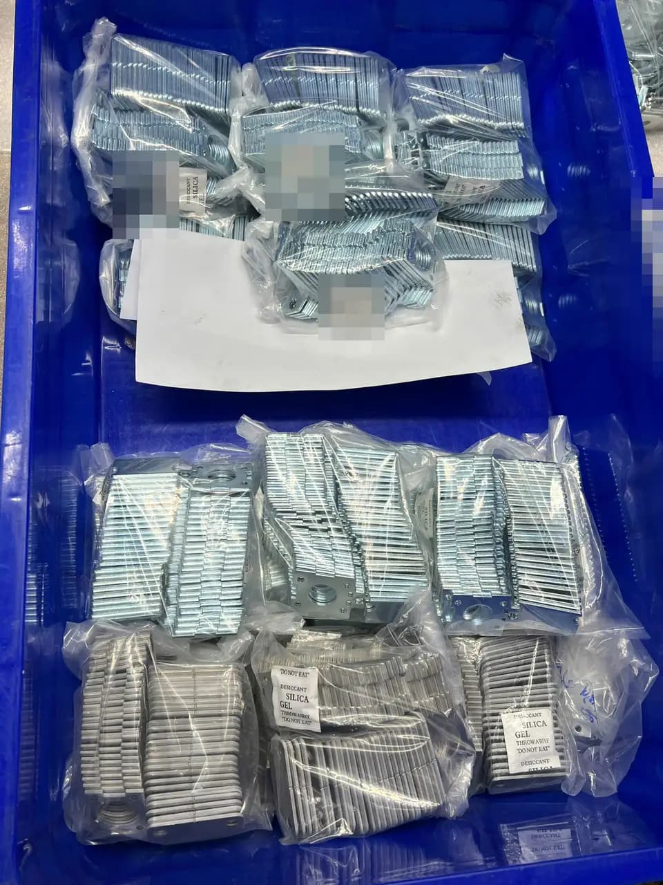 Representative packing illustration of bagged sample parts; not inspection evidence