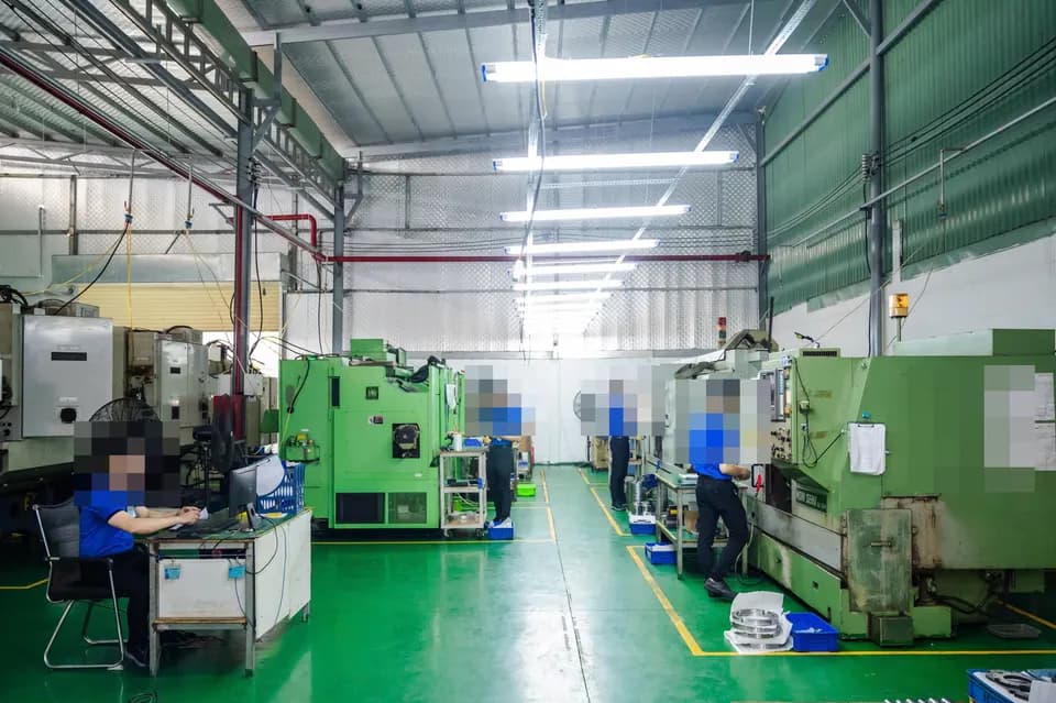 Representative CNC machining and production-floor imagery at a partner factory