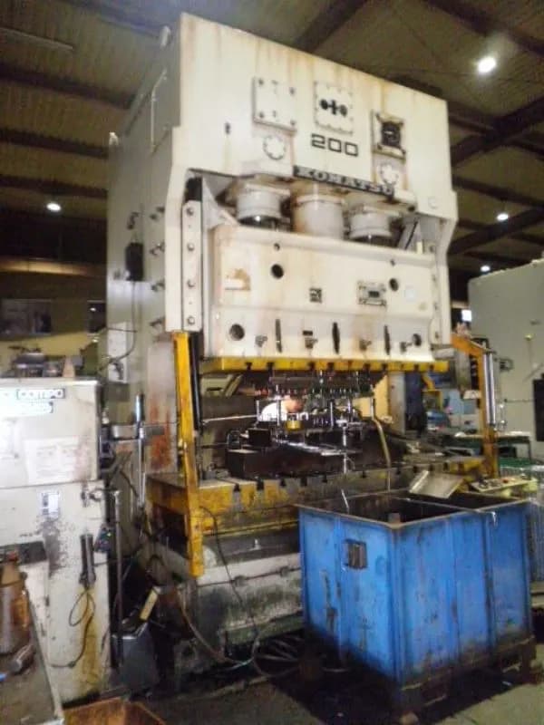 Representative large stamping press in a partner toolroom