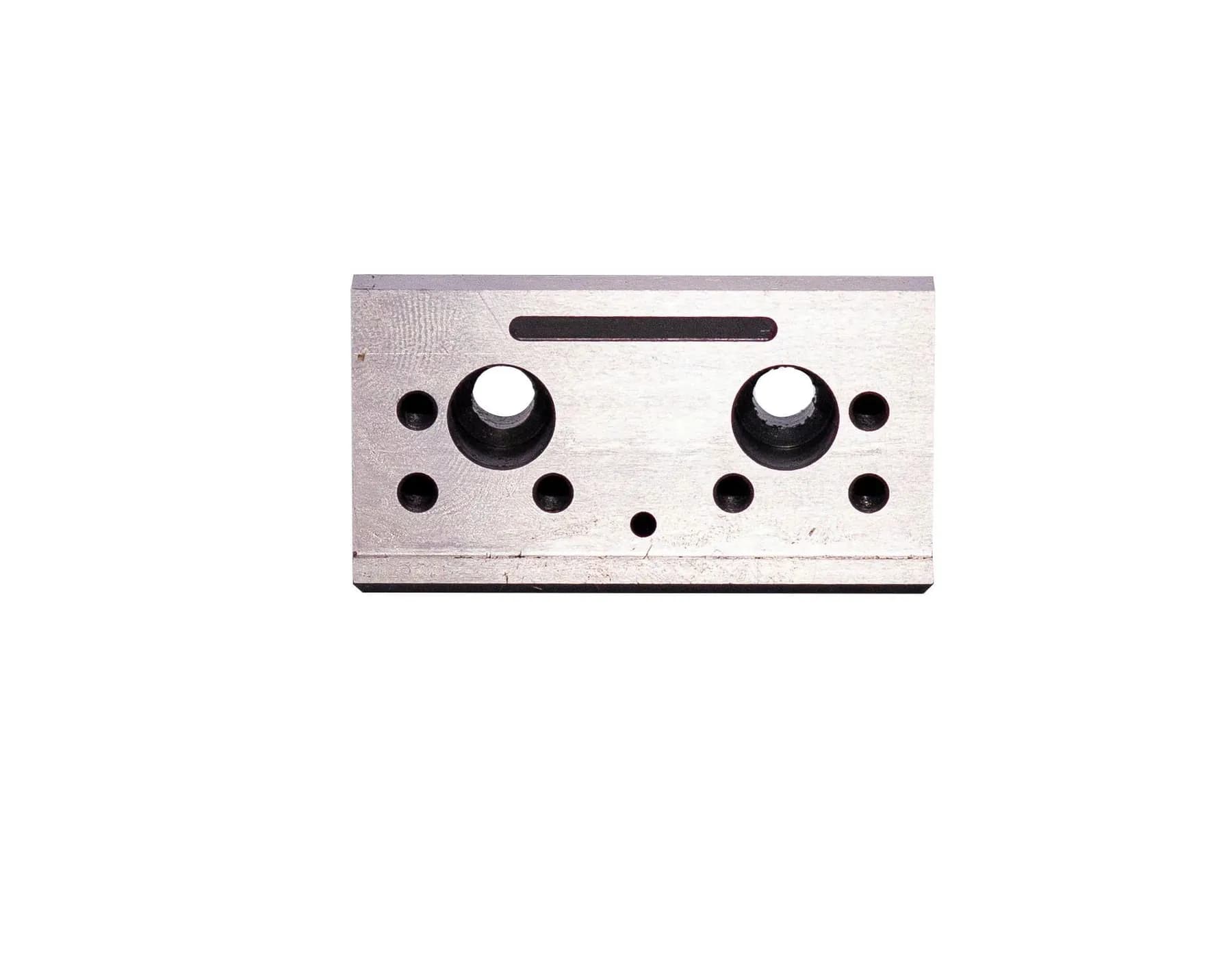 Precision machined or tooling component on clean background