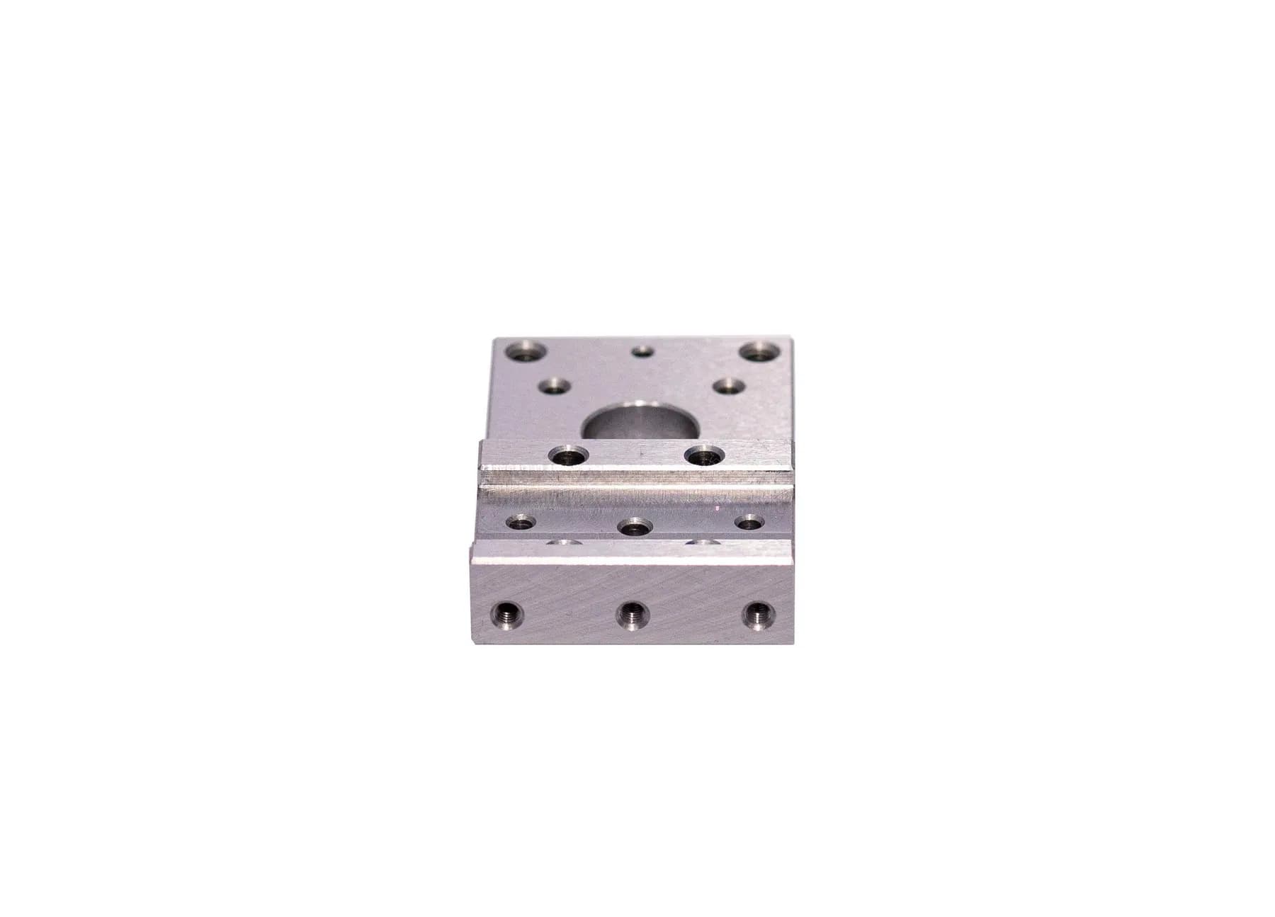 Precision machined or tooling component on clean background