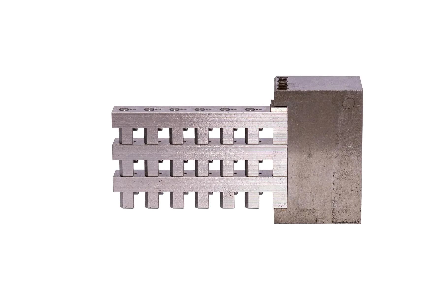 Precision machined or tooling component on clean background